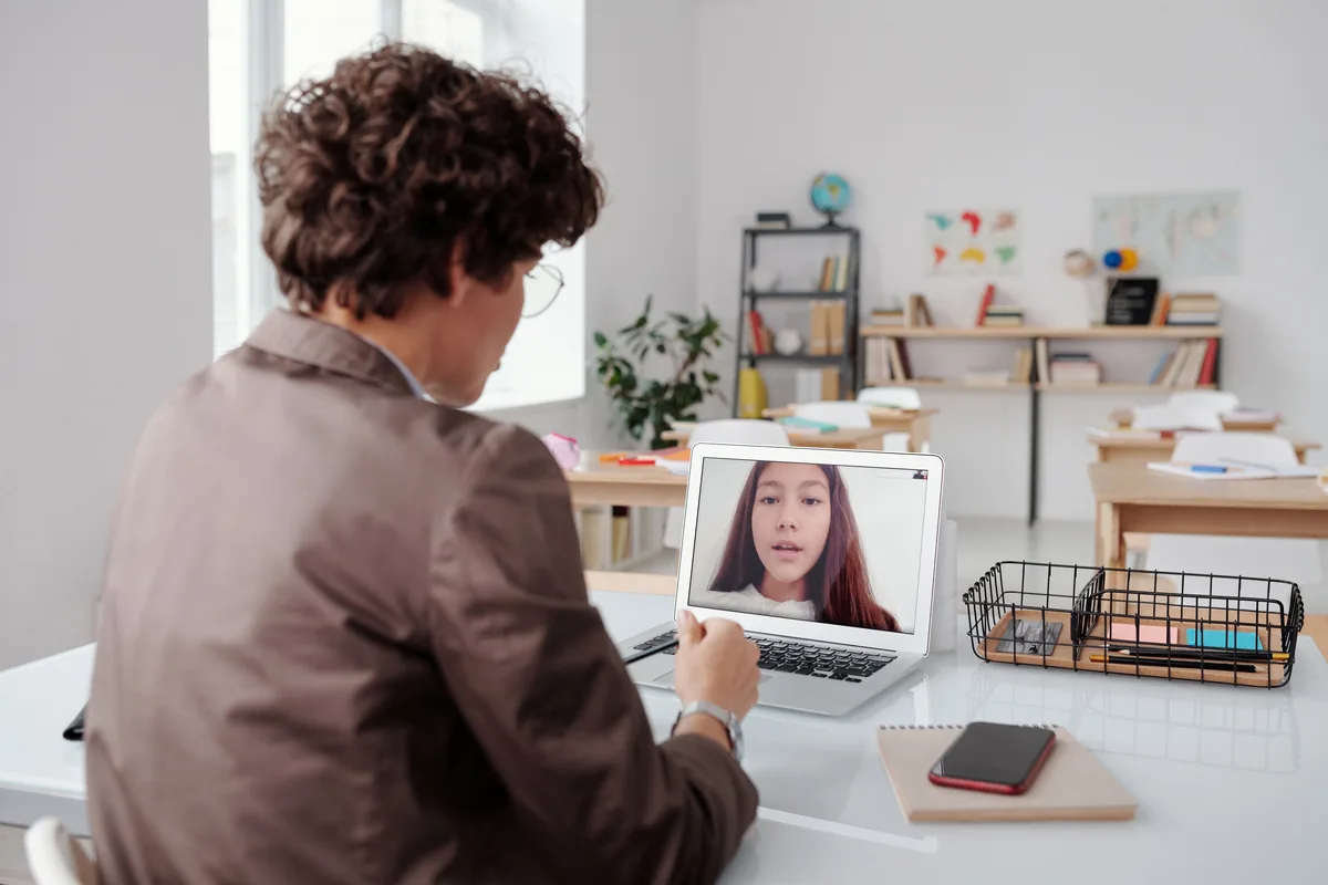 Educator taking part in an online professional learning session